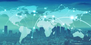 Global network connections over a city skyline, illustrating economic interdependence. - Supply Chain News