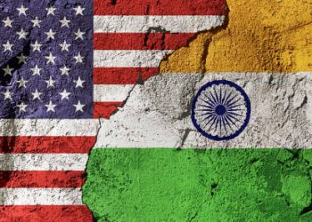 Cracked wall displaying the US and Indian flags, symbolizing a fractured relationship. - Supply Chain News